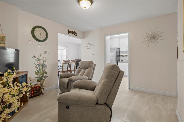 living room featuring light tile patterned floors