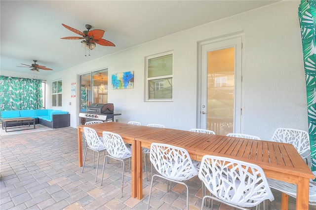 view of patio with outdoor lounge area, ceiling fan, and a grill