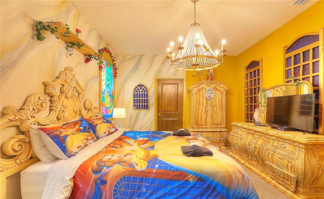 carpeted bedroom with a chandelier