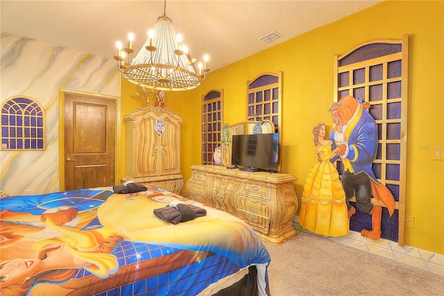 carpeted bedroom with a chandelier and a textured ceiling