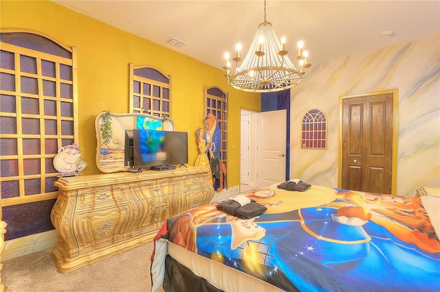 carpeted bedroom featuring an inviting chandelier