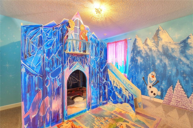 carpeted bedroom featuring a textured ceiling