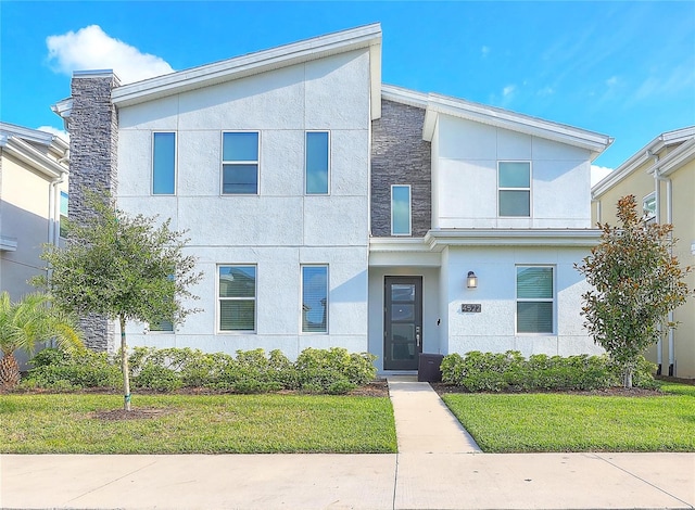 view of front of house featuring a front lawn