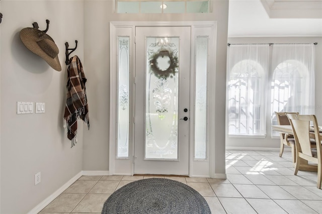 foyer with light tile patterned floors