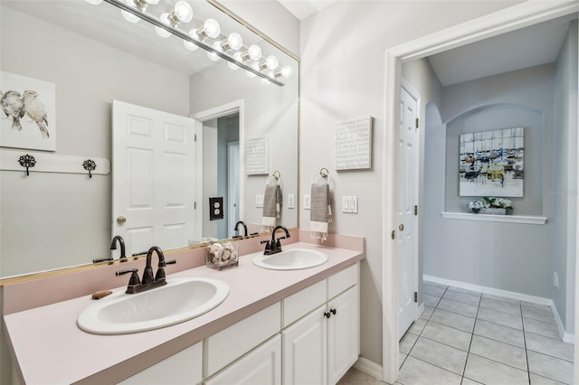 bathroom with vanity and tile patterned floors