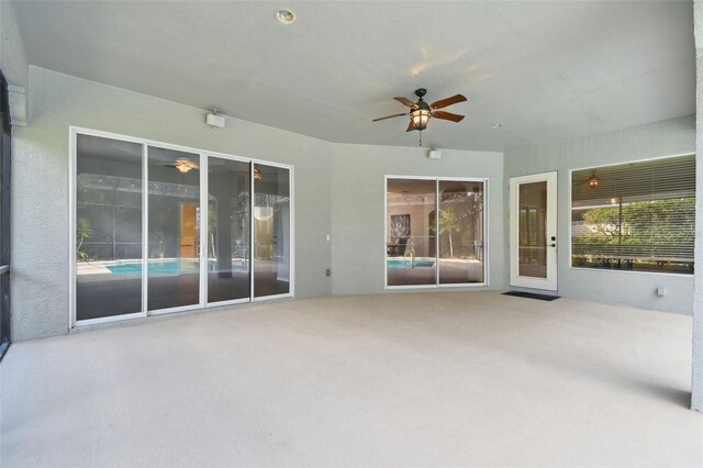 view of patio with ceiling fan