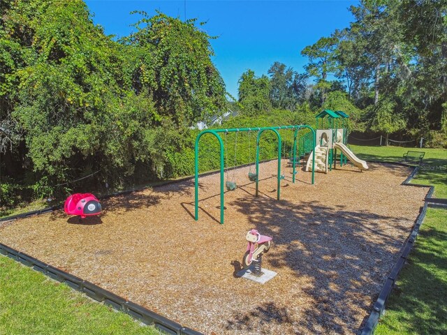 view of play area featuring a yard