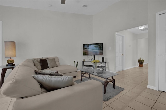 living room with light tile patterned flooring