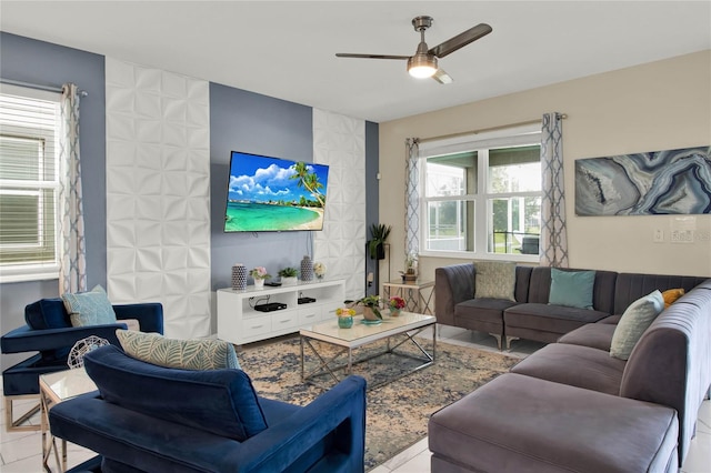 living room featuring ceiling fan and light tile patterned flooring