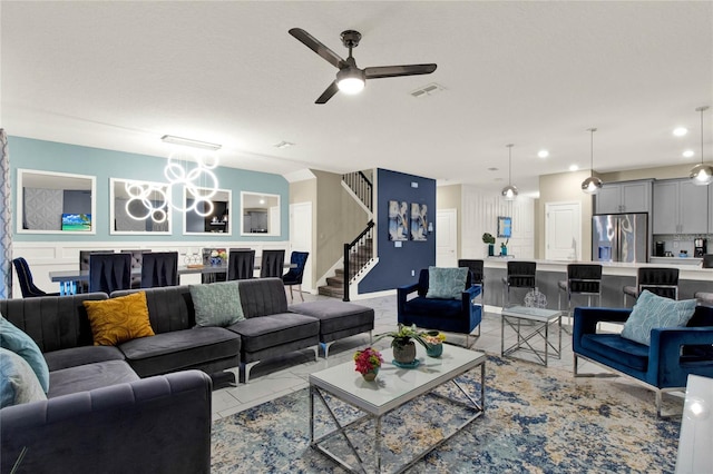 living room featuring ceiling fan