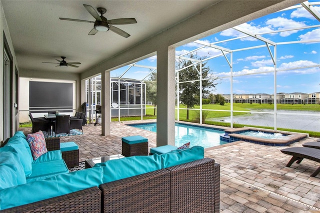 view of patio with glass enclosure, ceiling fan, a swimming pool with hot tub, and an outdoor hangout area