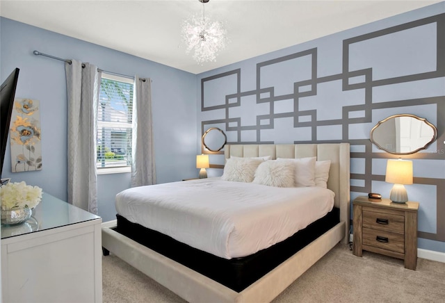 carpeted bedroom with a notable chandelier