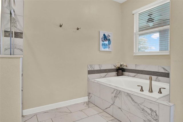 bathroom with tiled bath