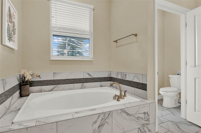 bathroom with a relaxing tiled tub and toilet