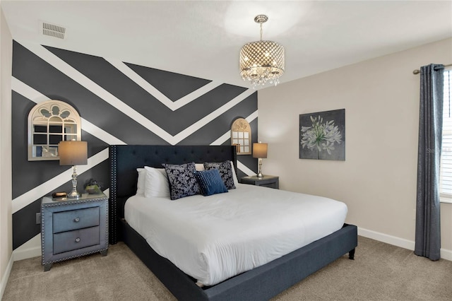 carpeted bedroom with a notable chandelier and multiple windows