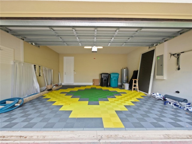 garage featuring electric panel and water heater