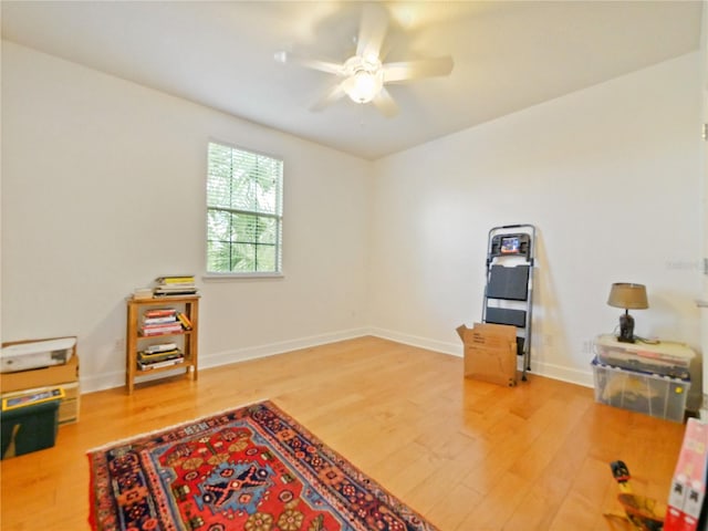 miscellaneous room featuring wood-type flooring and ceiling fan