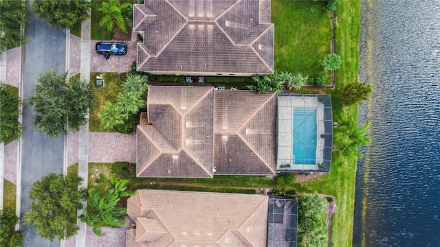 birds eye view of property featuring a water view