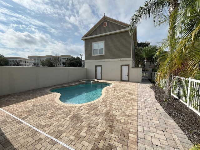 view of swimming pool with a patio area