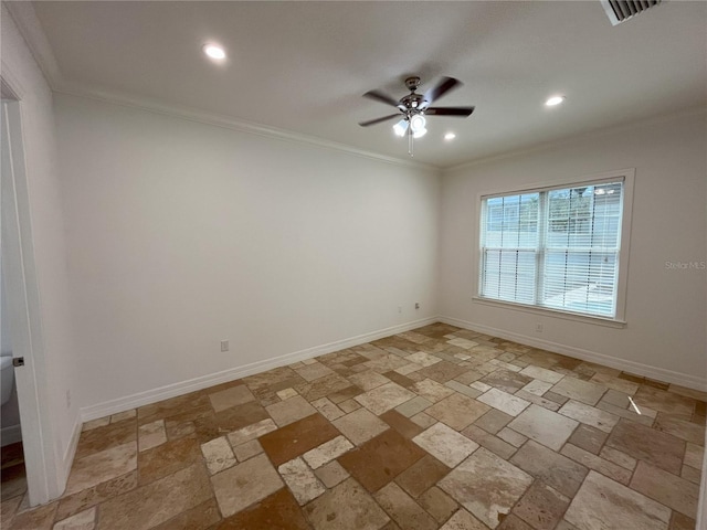 spare room featuring ceiling fan and ornamental molding