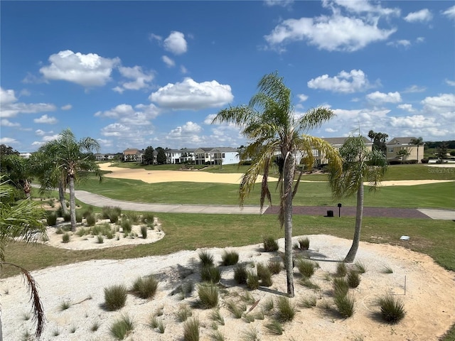 view of community featuring a lawn