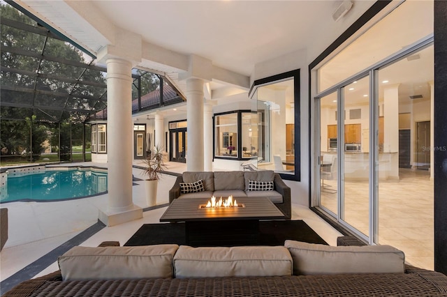 view of pool with an outdoor hangout area, a patio, and a lanai