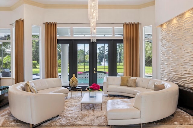 living room with ornamental molding and french doors