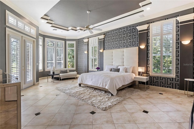 tiled bedroom featuring access to outside, ornamental molding, ceiling fan, and a raised ceiling