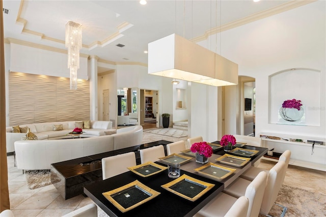 dining room featuring crown molding and light tile patterned floors