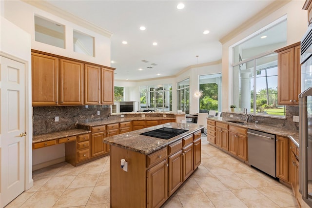 kitchen featuring kitchen peninsula, sink, dishwasher, a center island, and decorative backsplash