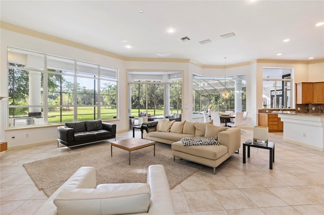 tiled living room with ornamental molding