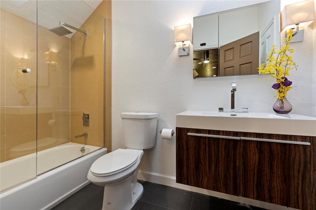 full bathroom featuring combined bath / shower with glass door, vanity, toilet, and tile patterned flooring