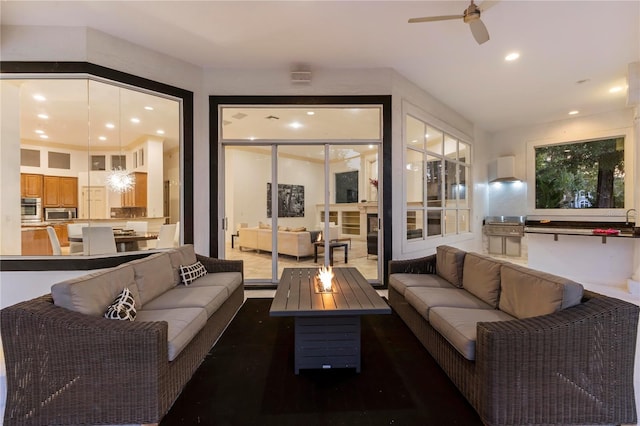 living room with ceiling fan