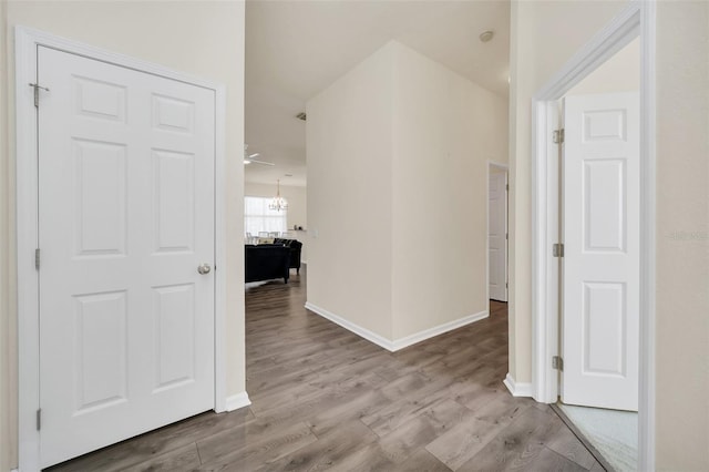 hall with light hardwood / wood-style floors