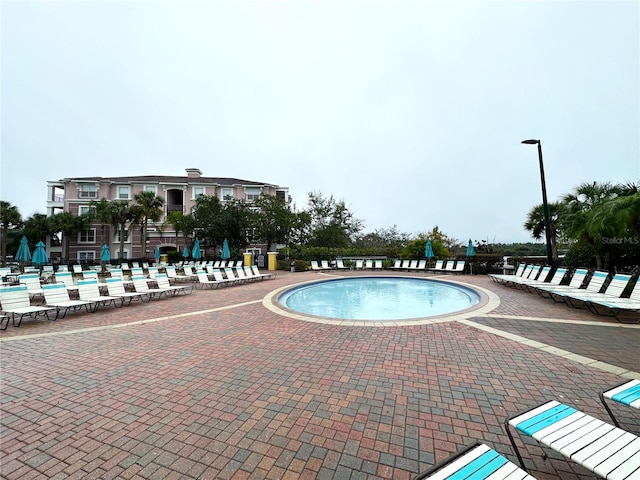 pool with a patio area