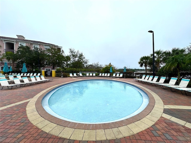 pool with a patio area