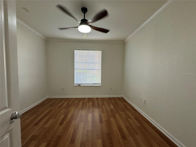 unfurnished room with a ceiling fan, crown molding, baseboards, and dark wood-type flooring