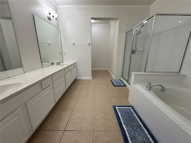 bathroom featuring a sink, a bath, ornamental molding, and tile patterned flooring