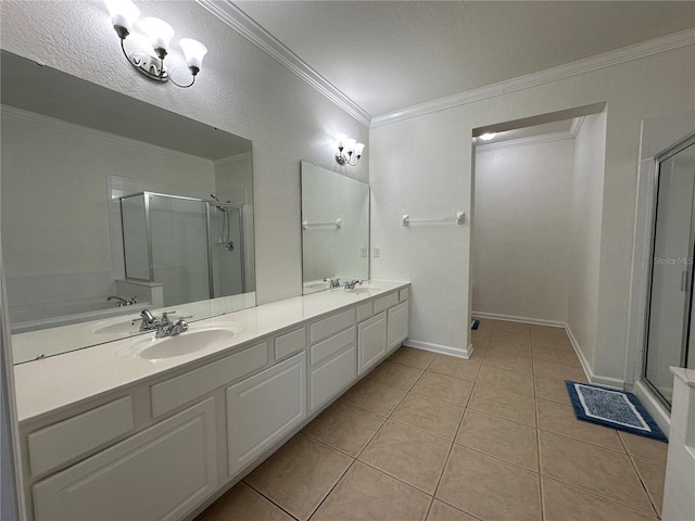 bathroom with visible vents, a shower stall, double vanity, ornamental molding, and tile patterned floors