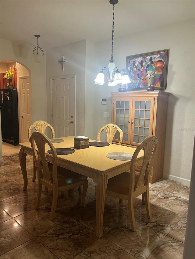 dining room with an inviting chandelier