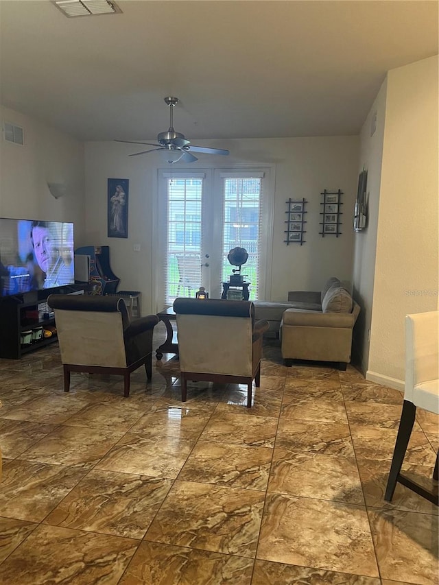 living room with ceiling fan