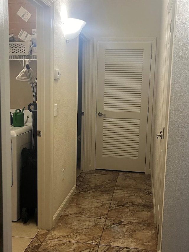 corridor with washer / dryer