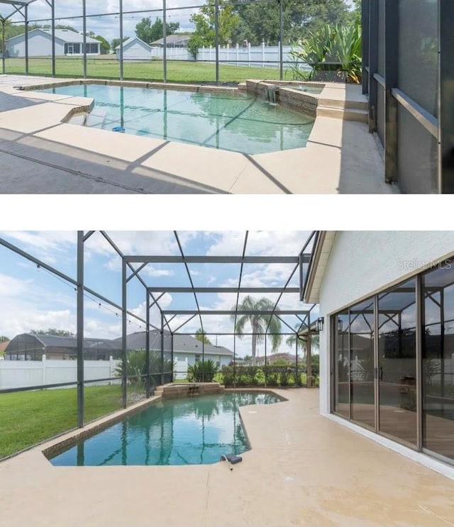 view of swimming pool featuring a yard, a lanai, and a patio area