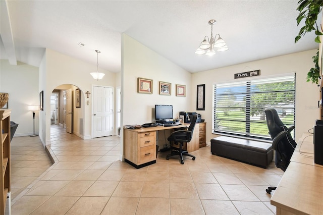 office featuring vaulted ceiling, an inviting chandelier, and light tile patterned floors