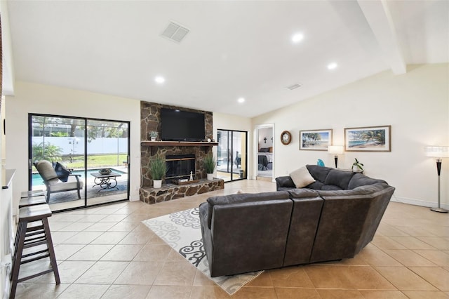 tiled living room with a fireplace and lofted ceiling with beams