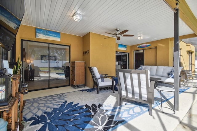 view of patio with ceiling fan and outdoor lounge area