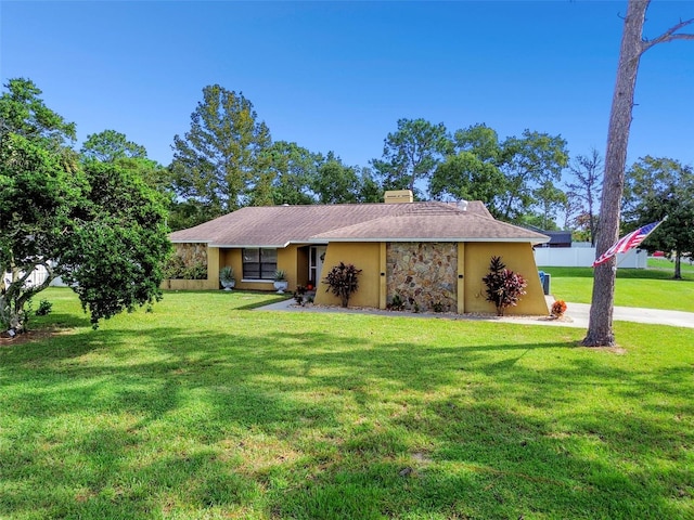 exterior space with a front yard