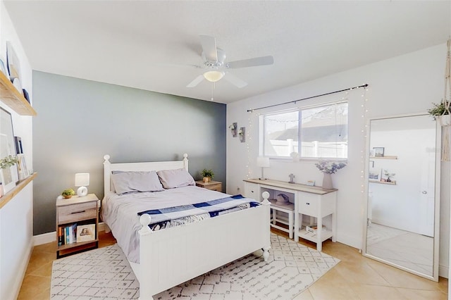 bedroom featuring ceiling fan and light tile patterned flooring