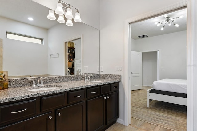 bathroom featuring vanity and hardwood / wood-style floors