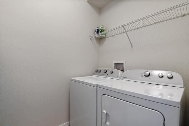 washroom with washer and clothes dryer